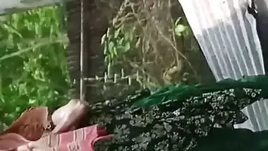 Village neighbor girl outdoor bath caught through hole