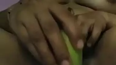 Dick-hungry Indian girl dildoing pussy with banana