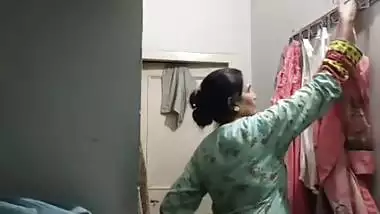 Mom changing dress caught on camera by horny son