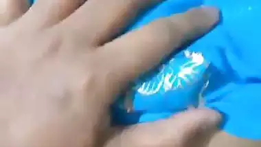 Desi chudai of Bhabhi lying on bed in blue saree