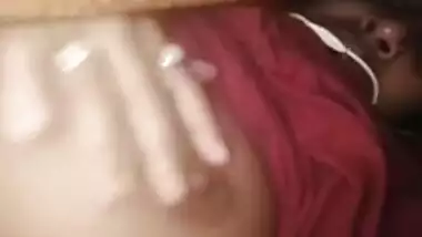 Lecherous Desi gal demonstrating her tits online under the blanket